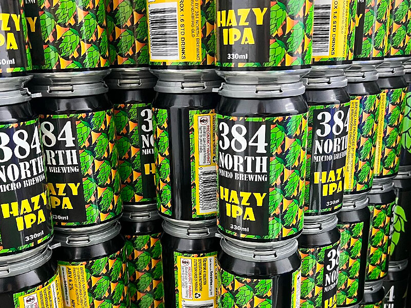 Stacks of Hazy IPA cans ready for purchase