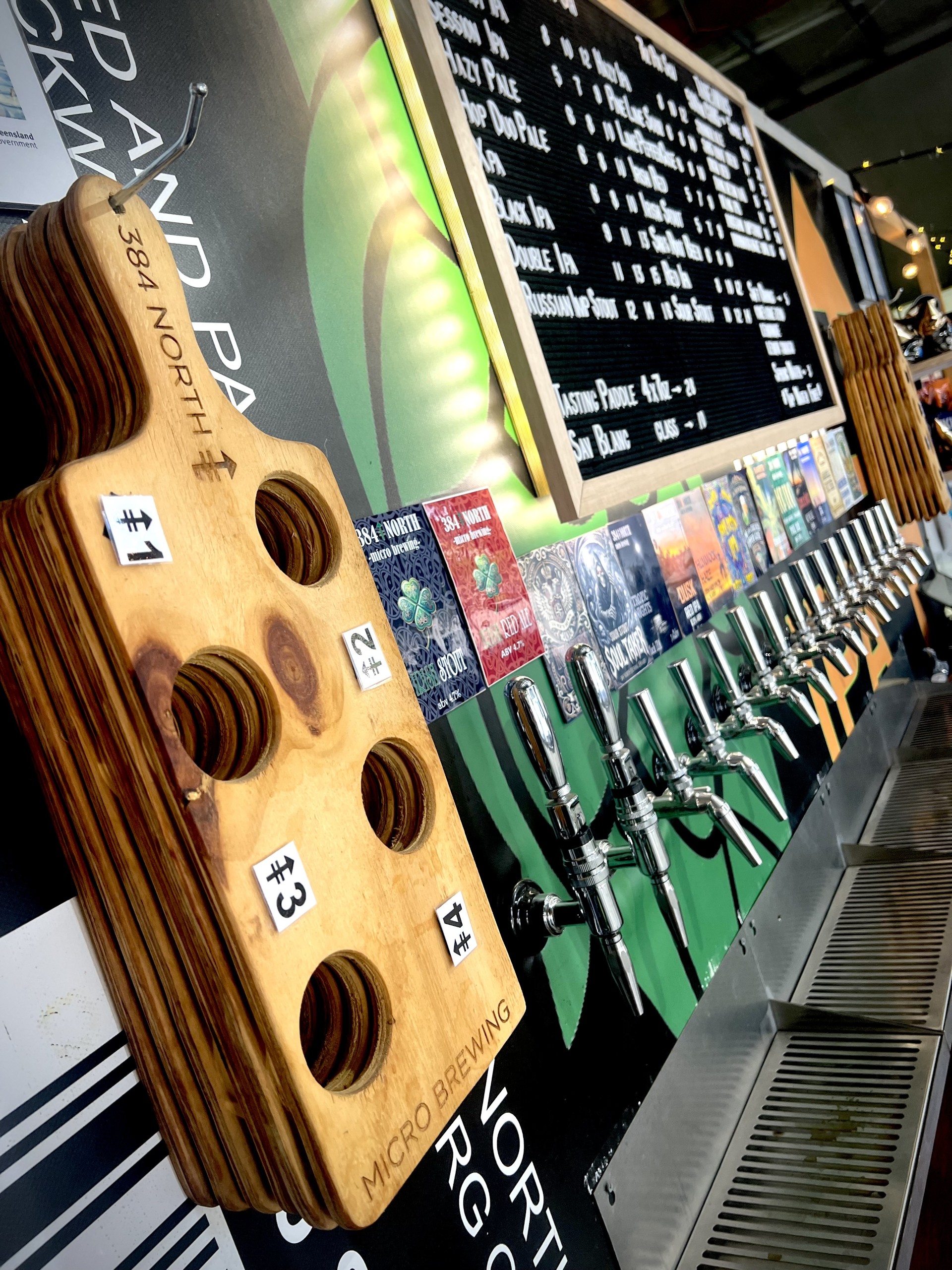 Row of taps with 384 North Brewing beer